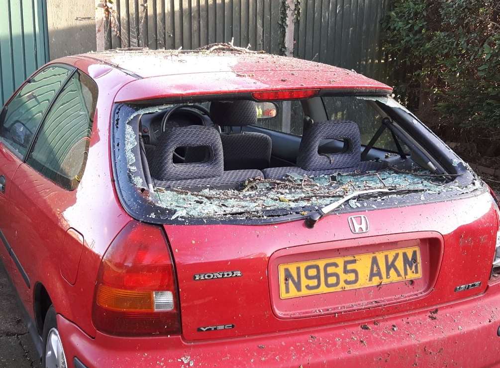 The car's back window was smashed