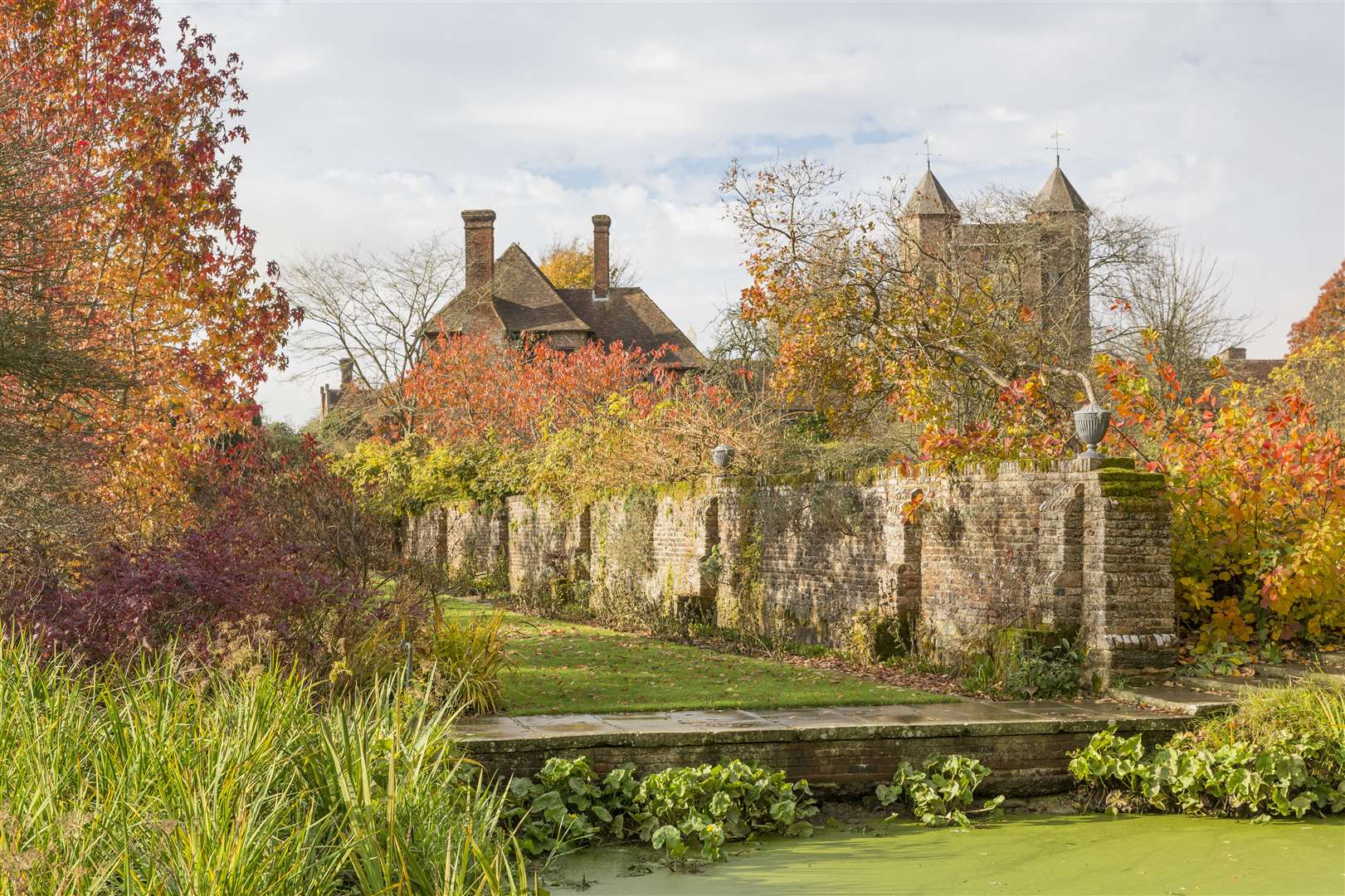 The gatehouse tower through the autumnal gardens at Sissinghurst Castle Garden Picture: National Trust/James Dobson