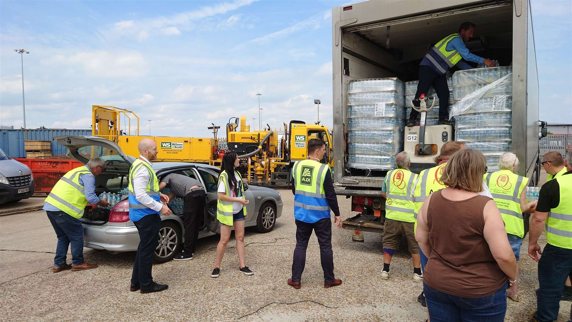 Aldi and Queenborough Town Council joined forces to help. Councillors bought up supplies of water from the firm's distribution centre and handed them out to Queenborough and Rushenden residents with help from haulage firm Wigglesworth. Picture: Cameron Beart