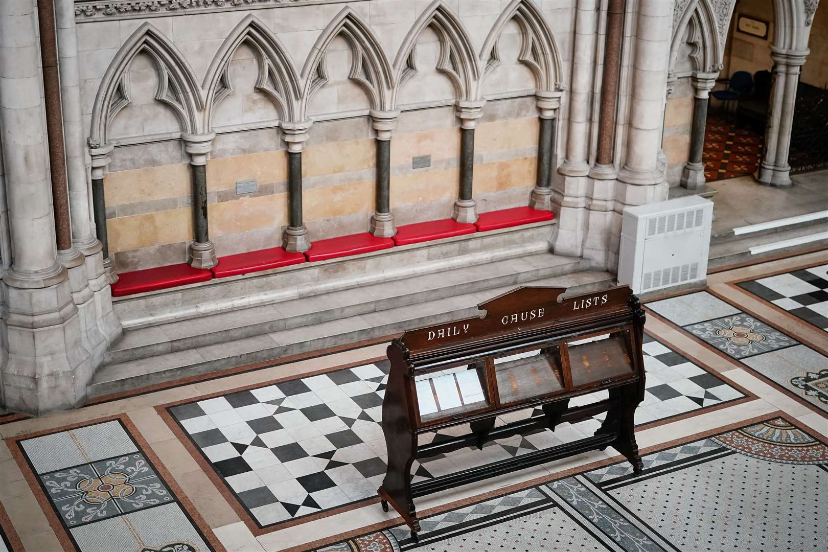 The daily cause list boards inside the main hall at the Royal Courts of Justice in central London (Aaron Chown/PA)