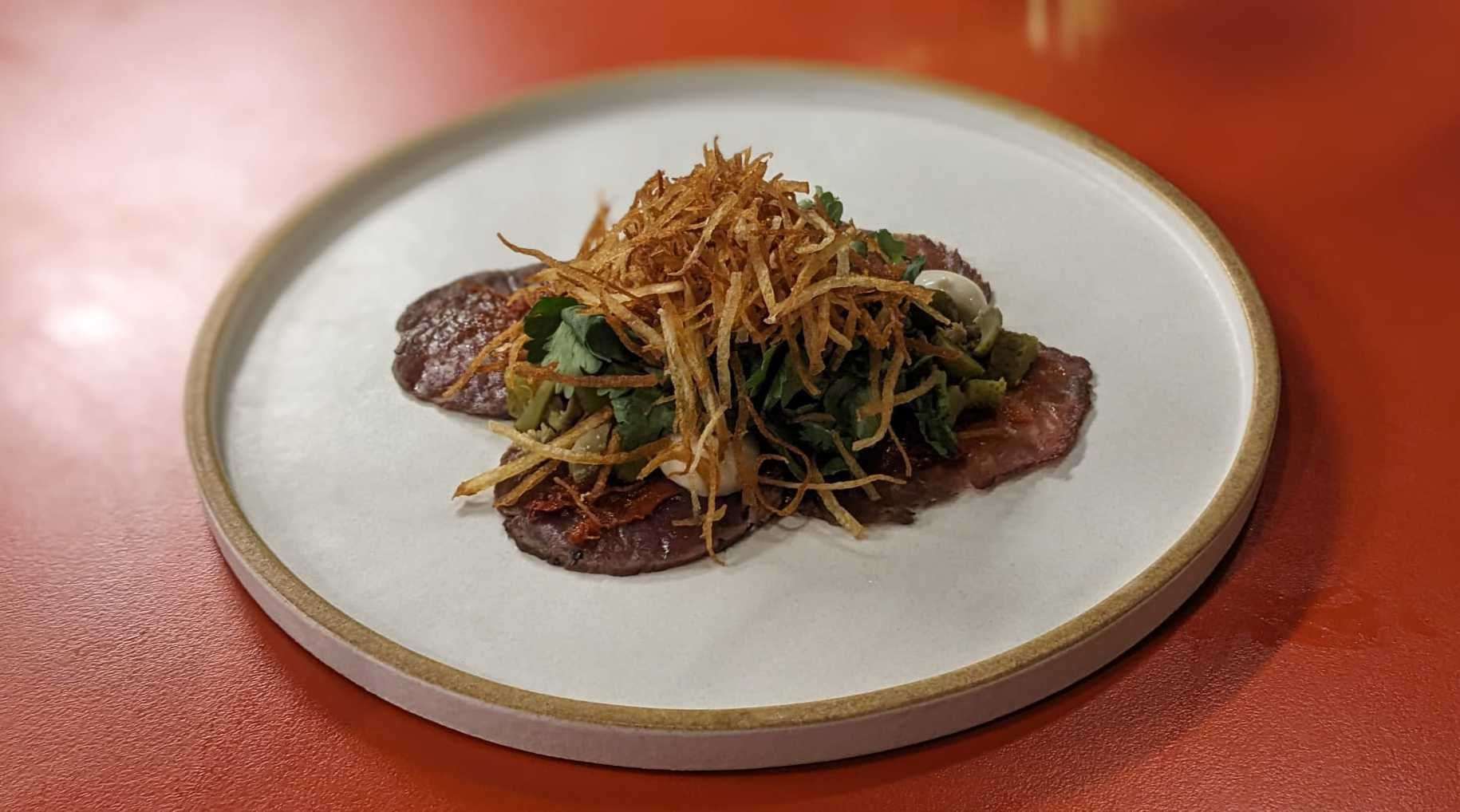 Venison carpaccio with nduja, capers and anchovy mayo at Pomus in Margate