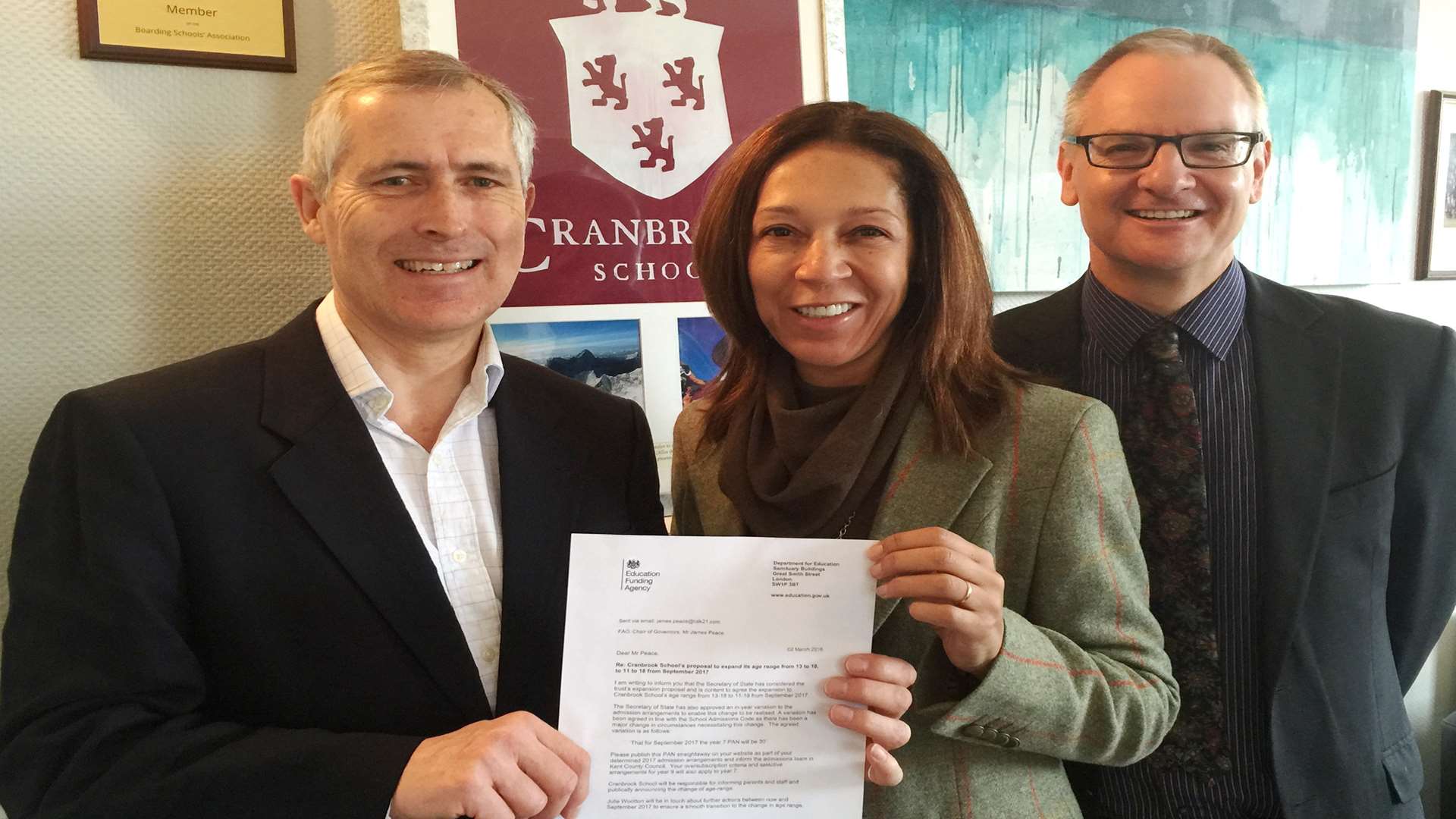 James Peace, Helen Grant and John Weeds with the letter of approval