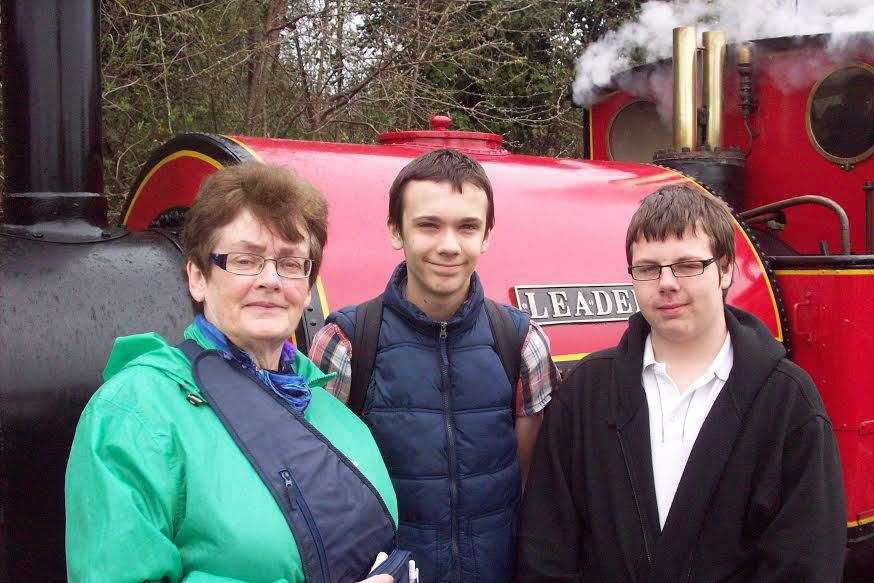 Lesley Evans got the chance to ride up front in a train thanks to Sittingbourne and Kemsley Light Railway. She is pictured with Fulston Manor School Year 10 students Josh Mepstead and Bernard Redman