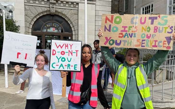 Young people protesting outside County Hall in Maidstone over youth service funding cuts