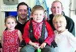 Rob Delderfield (right) and Lloyd Guinan, of Designer Signs UK Ltd, main sponsors of charity show Performance, Comedy and Dance with Grace Williams, four, (left), who has Turner Syndrome, Philip Hoare, eight (centre) and Kallum Myhill (six). Picture: Mary Louis