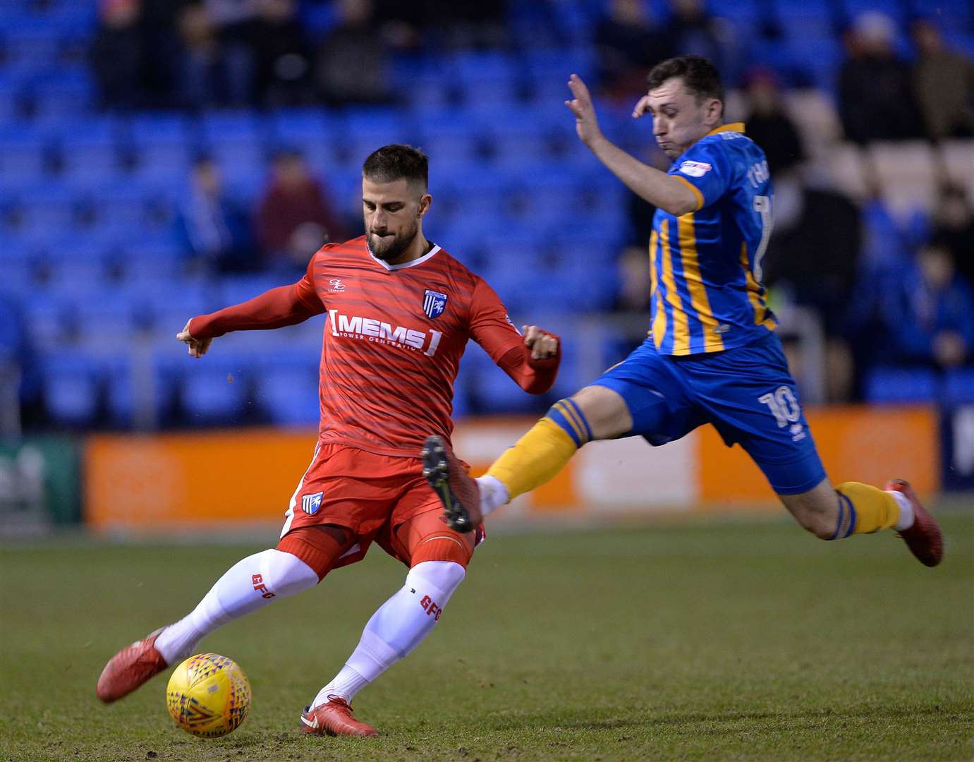 Gillingham’s Max Ehmer challenges with Nathan Thomas against Shrewsbury in February 2018 Picture: Ady Kerry