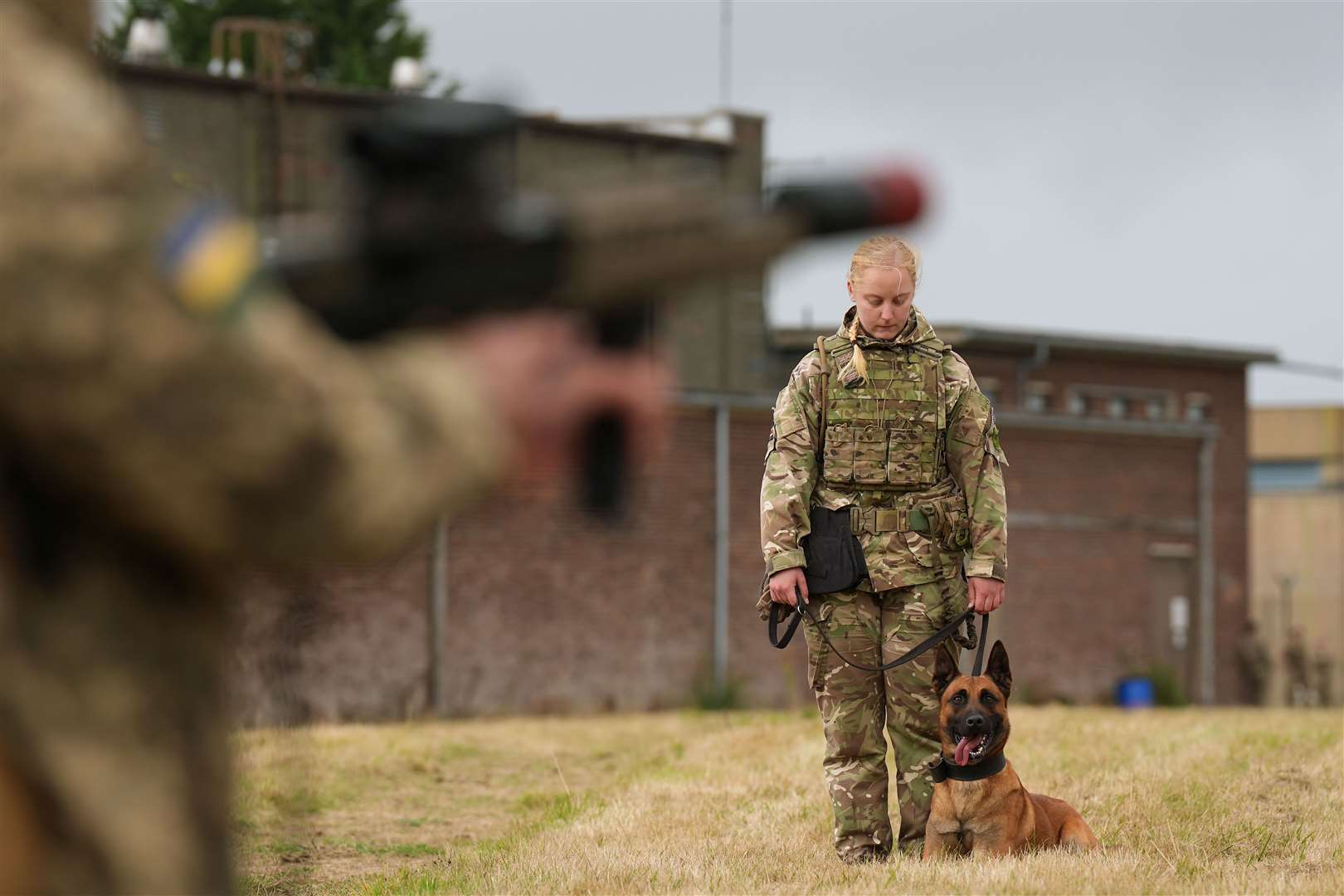 Private Freya Brown with her military working dog Zac during a training session (Joe Giddens/PA)