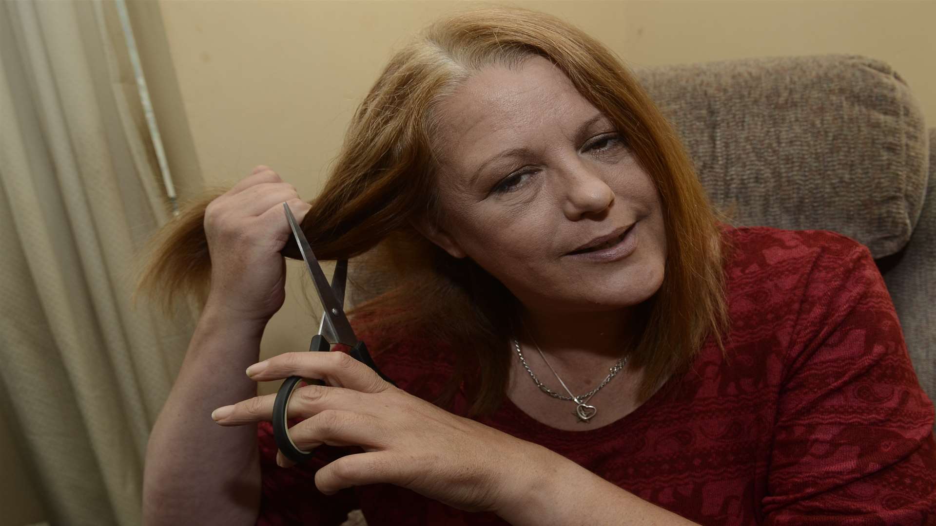 Michelle Murphy, of St Agnes Gardens, Sheerness, before the head shave