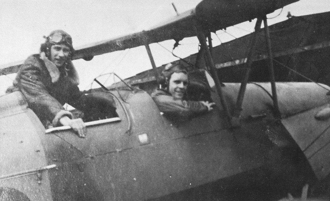 Second World War pilot Des Page (front) learning to fly in a Tiger Moth.