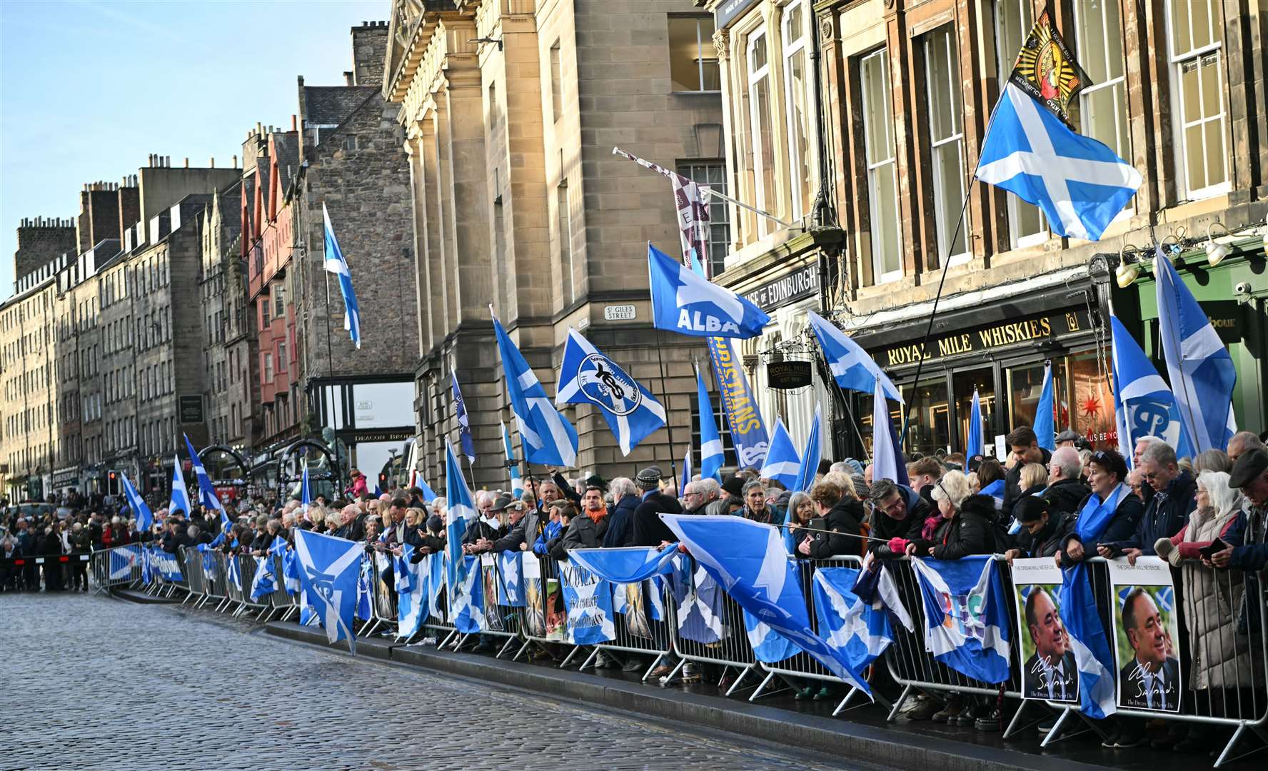 Hundreds of supporters stood outside St Giles’ Cathedral to pay tribute to Mr Salmond (Andy Buchanan/PA)