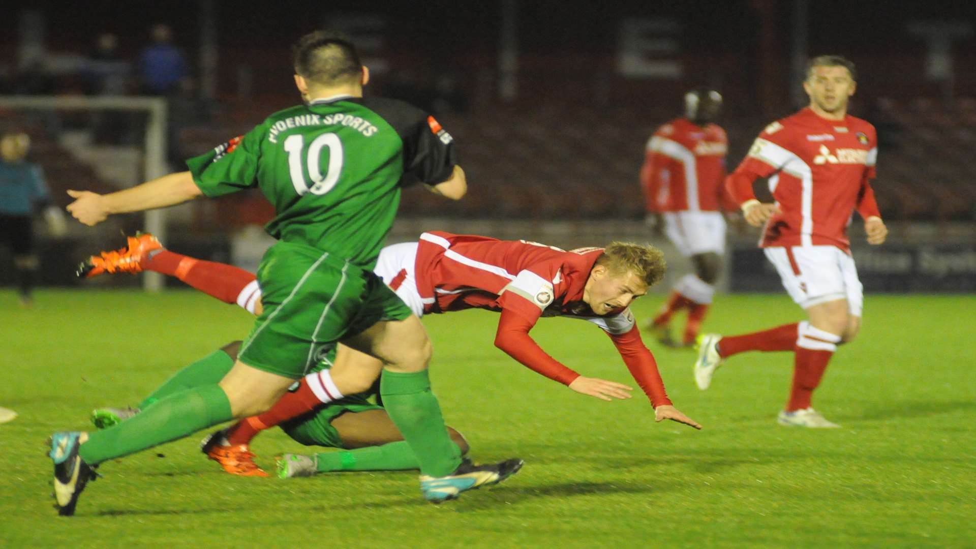 Ebbsfleet's Jordan Parkes takes a tumble against Phoenix Sports Picture: Steve Crispe