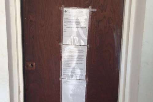 The closure orders on the doors of the two flats. Picture: Kent Police