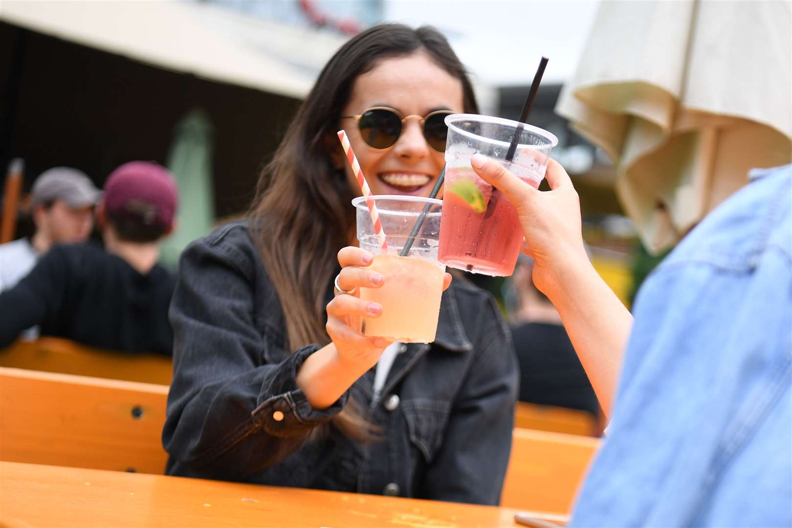 People enjoy drinks at the Vinegar Yard bar, London (Kirsty O’Connor/PA)