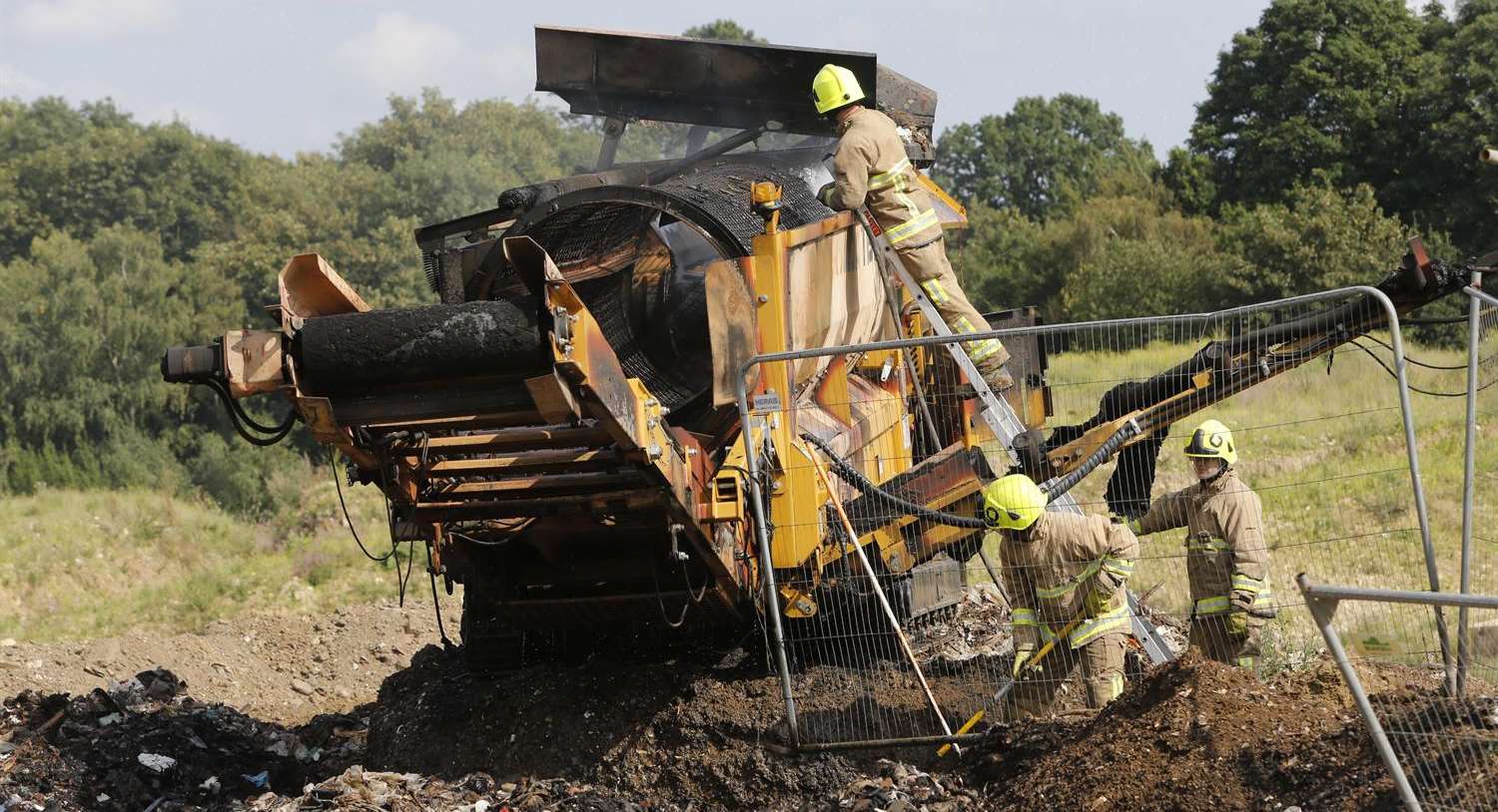 Firefighters damp down after the blaze