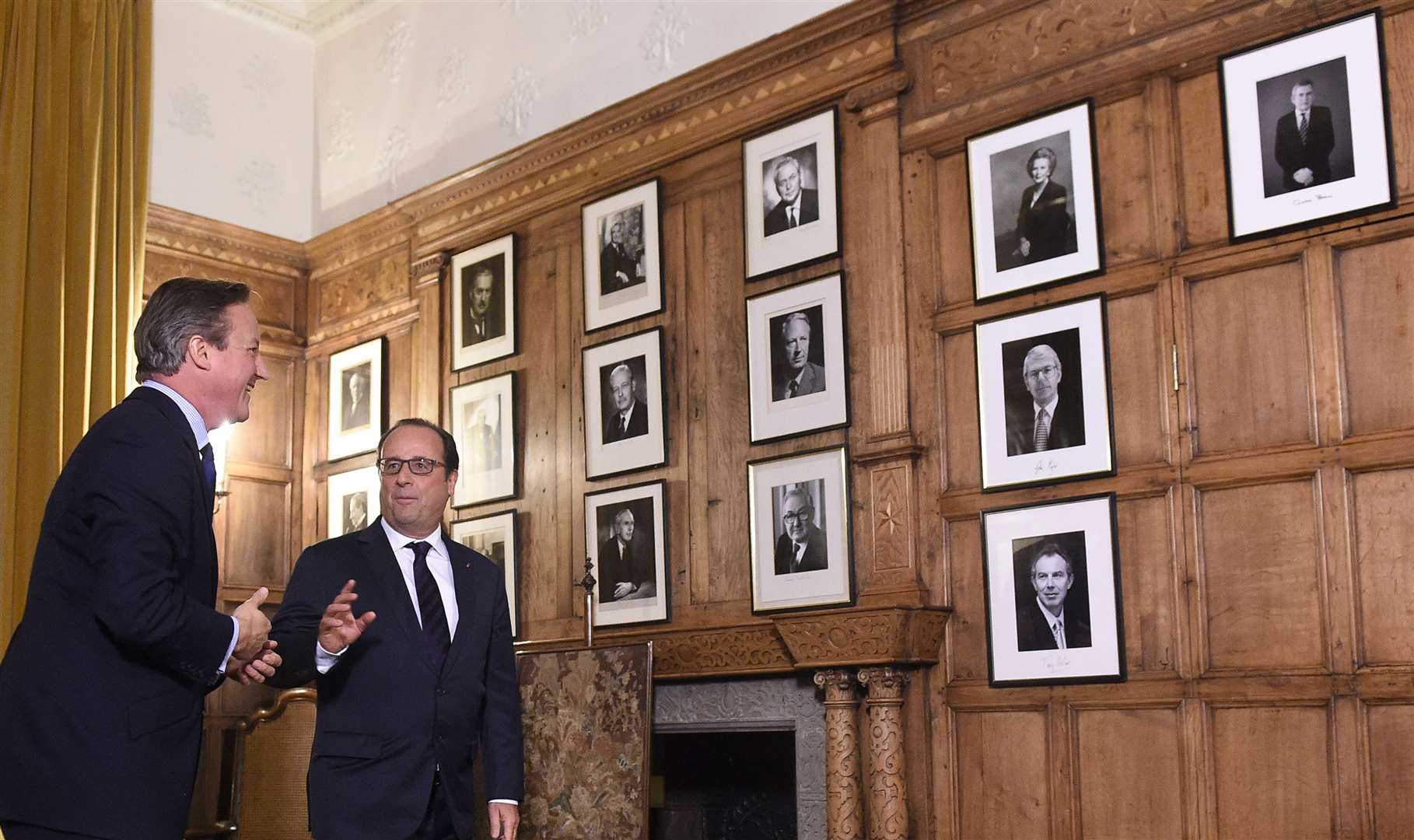 Photos of former prime ministers hang in the Great Parlour at Chequers (Facundo Arrizabalaga/PA)