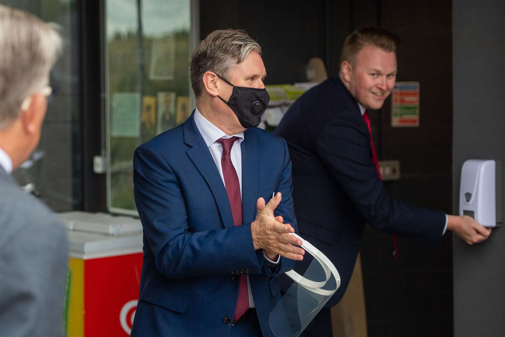 Labour leader Sir Keir Starmer sanitises his hands as he arrives to meet care workers and the families of care home residents in Nottinghamshire (Joe Giddens/PA)