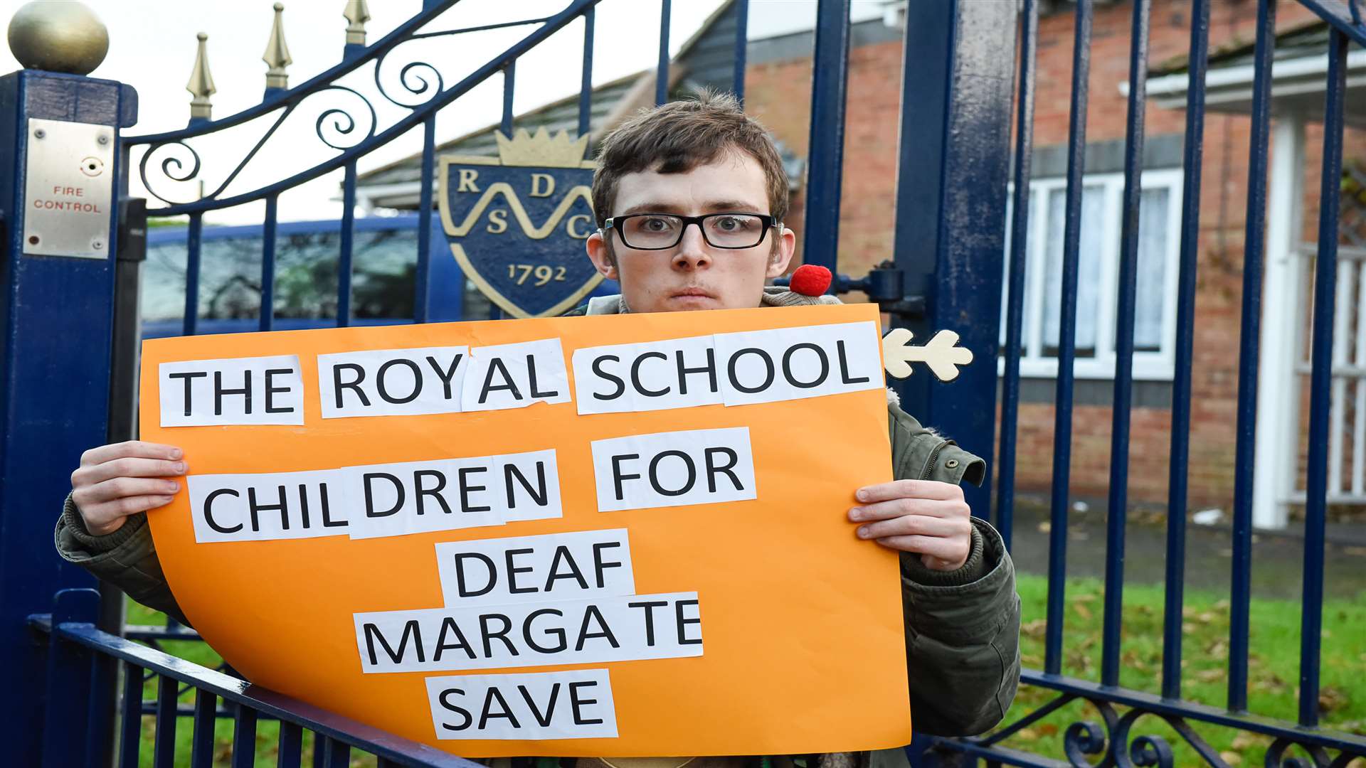 Wilfried Jenkins has been at the school since 2003 and attended the protest to show how much the school means to him.