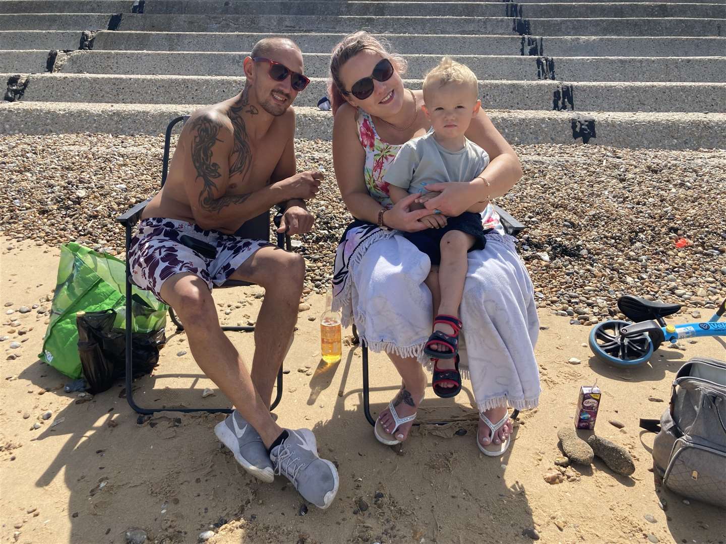 Ryan Holman and Veronica Upton with two-year-old Rory. They wanted to take him to the paddling pool but it was shut