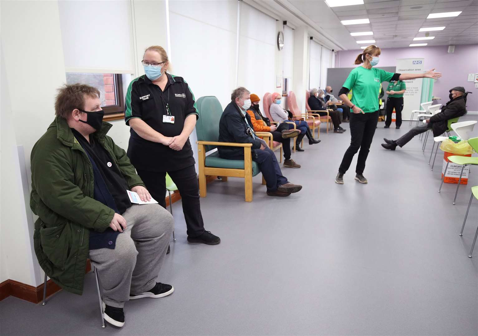 Gavin Howcroft (left) had his jab at the Hertfordshire Community NHS Trust-run (HCT) Robertson House in Stevenage (Yui Mok/PA)