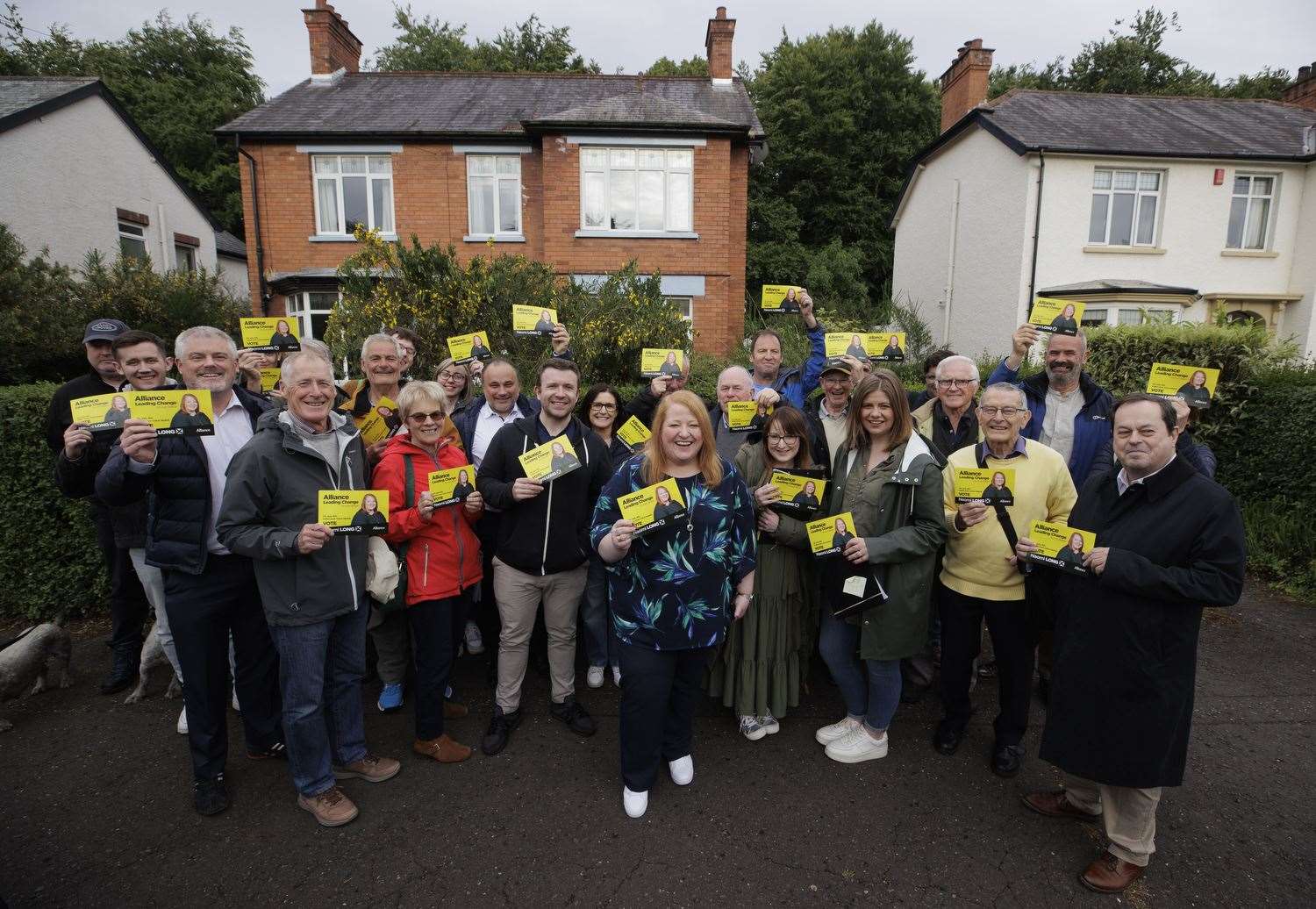 Alliance leader Naomi Long (centre) with her canvassing team in East Belfast (Liam McBurney/PA)