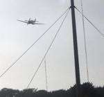 Spitfire flies over Duke of York's School