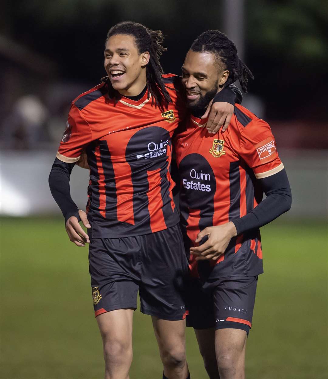 Dwade James, right, is congratulated by Chaynie Burgin on scoring the Brickies' third against VCD. Picture: Ian Scammell