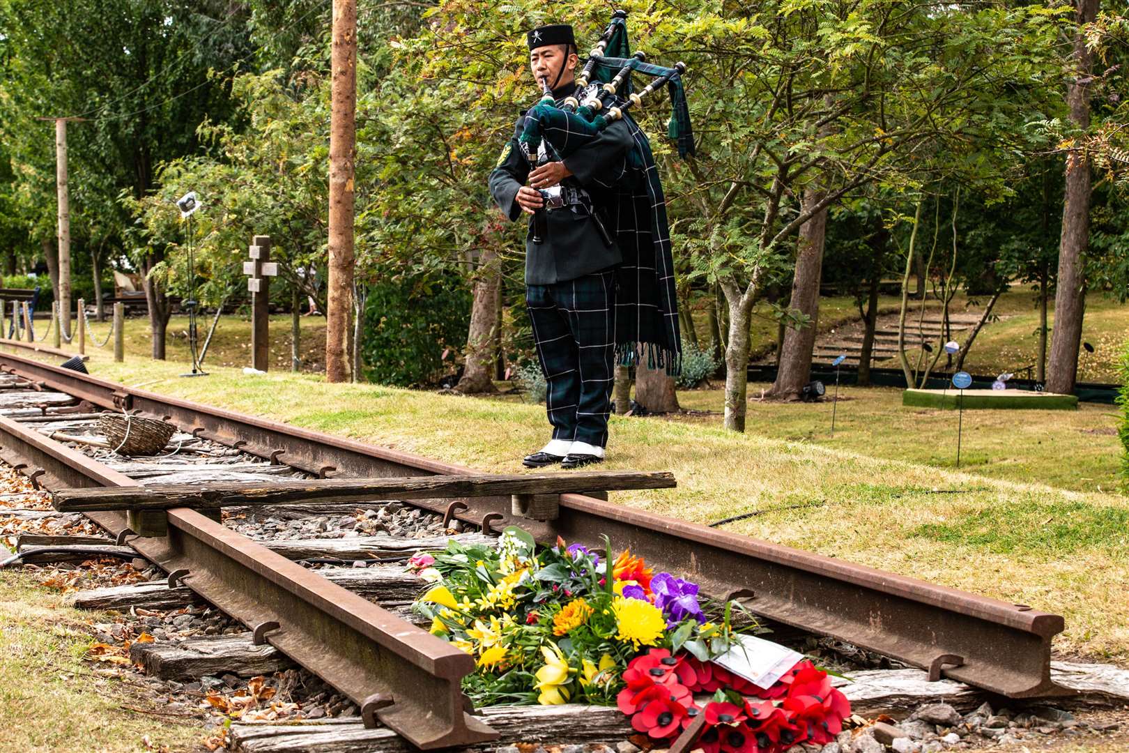 Colour Sergeant Lil Bahadur Gurung playing the pipes at the Sumatra Railway Memorial (Sgt Graham Taylor RAF/MoD/PA)