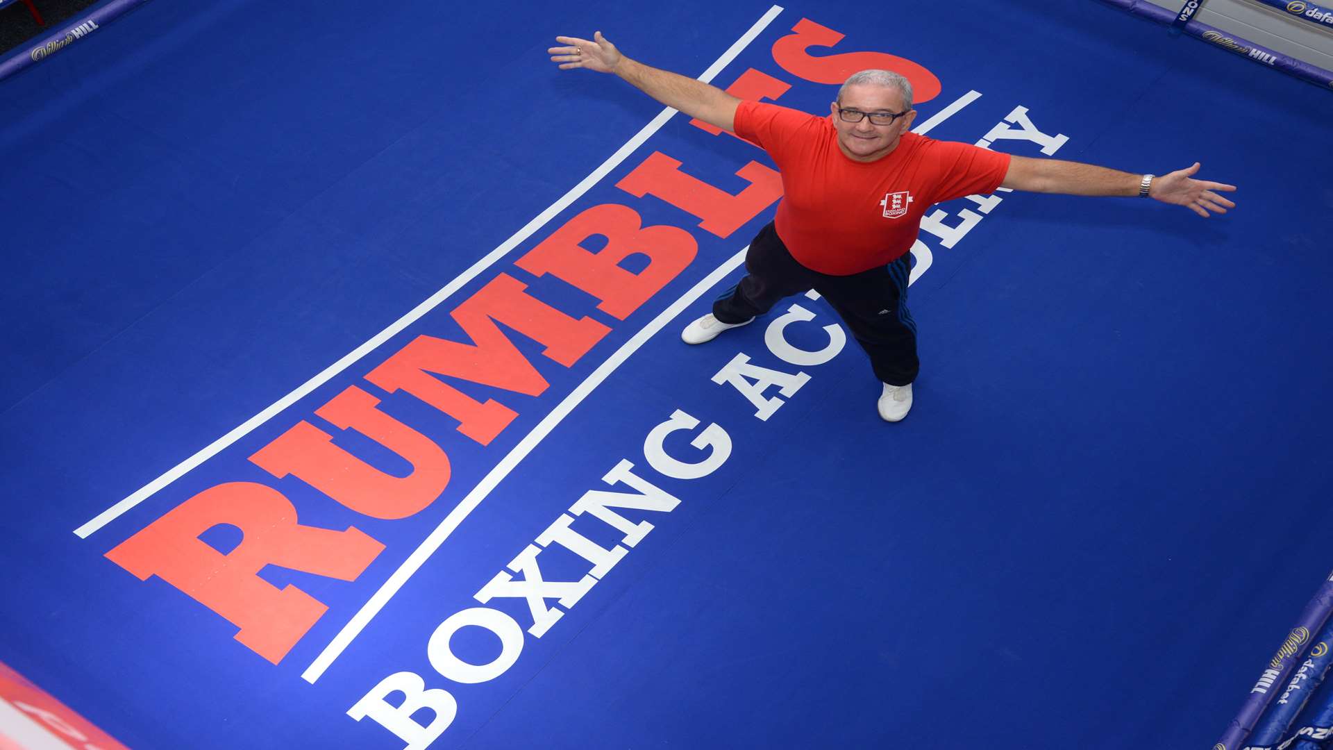 Boxing coach Charlie Rumble in the ring at his academy