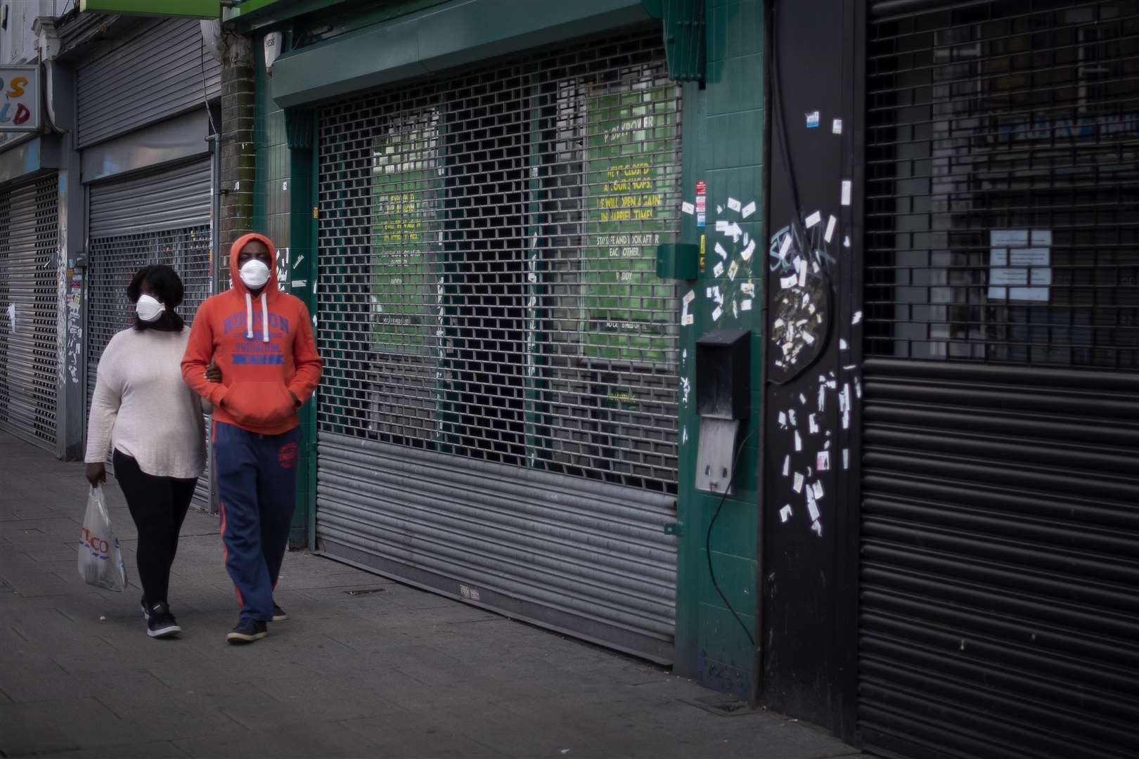 People have been advised to wear face coverings in shops and on public transport (Victoria Jones/PA)