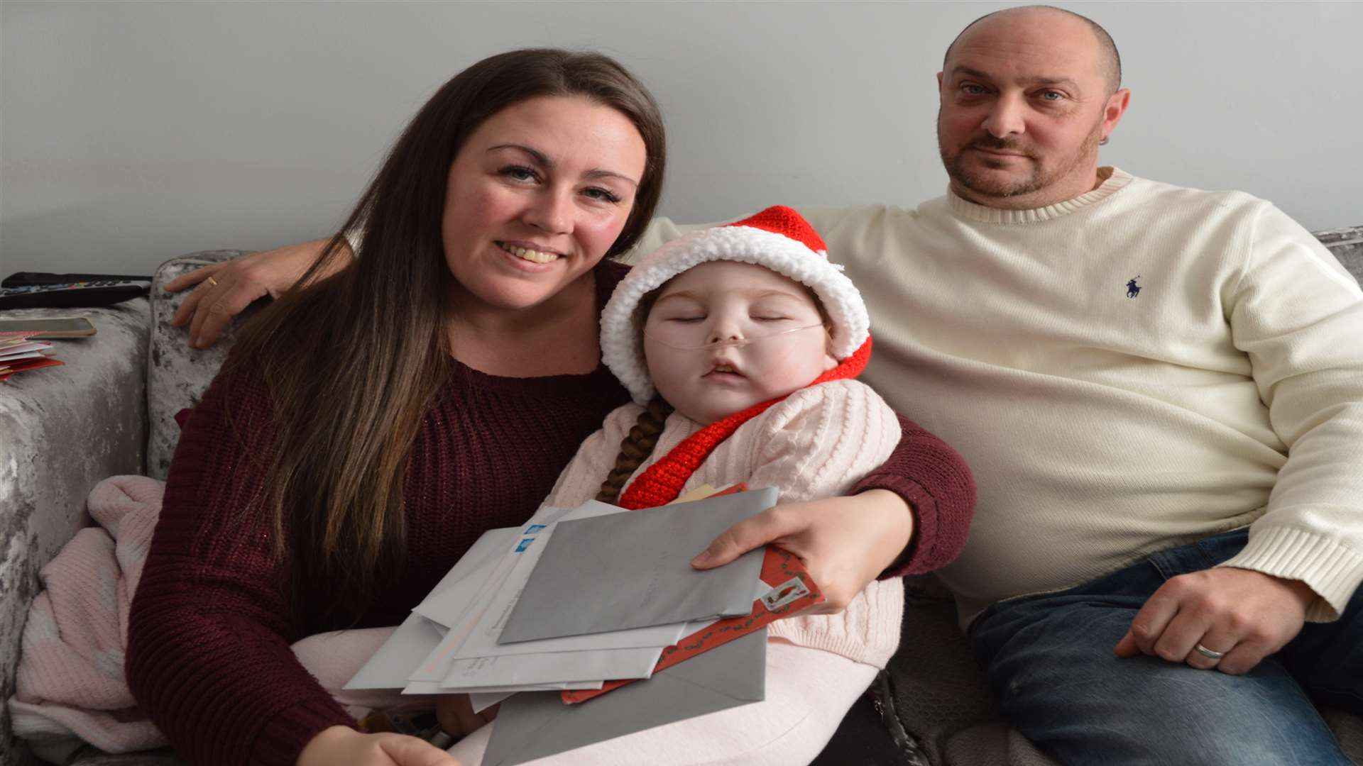 Ezmae Catley and parents Claire Morrish and David Catley