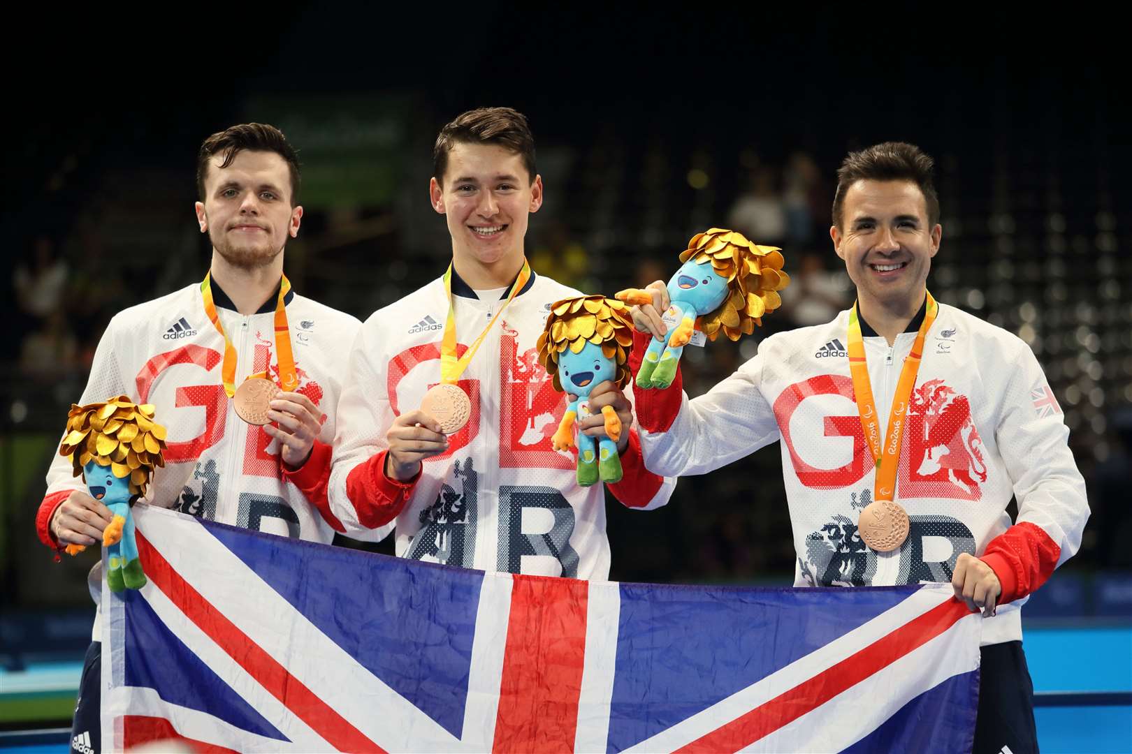 Minster's Ross Wilson celebrates table tennis team bronze with team-mates Aaron McKibbon and Will Bayley at the Rio Paralympics Picture: onEdition Media