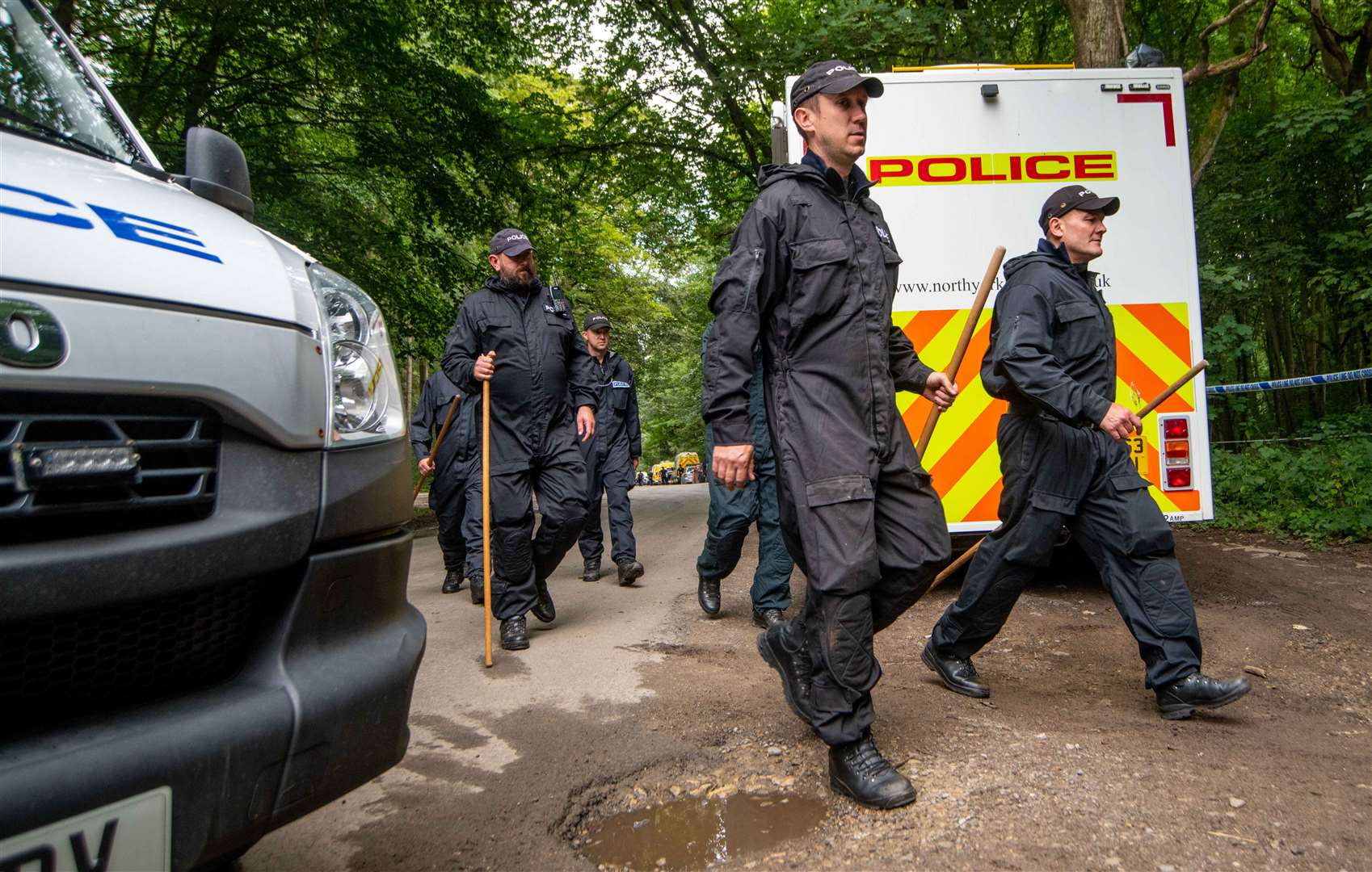 Police officers searching the land at Sand Hutton Gravel Pits near York in connection with the disappearance of missing university chef Claudia Lawrence (Mark Brickerdike/PA)