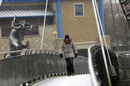 A pedestrian braves the weather in Maidstone