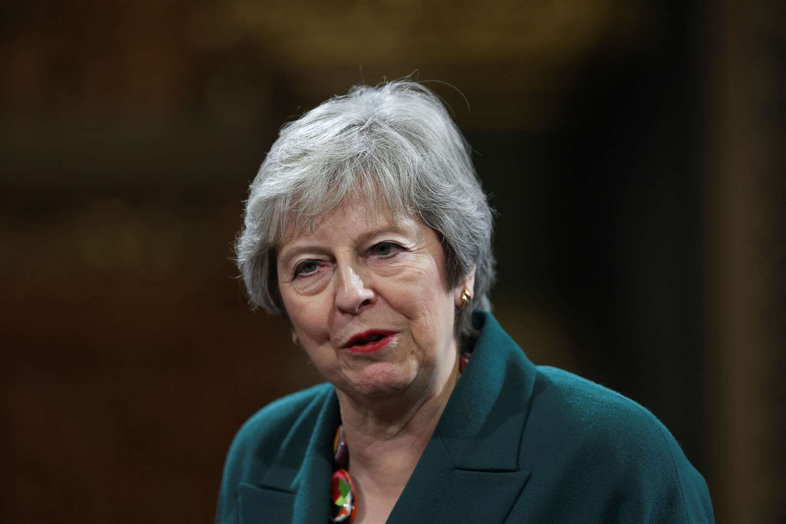 Former prime minister Theresa May is also stepping down (Hannah McKay/PA)