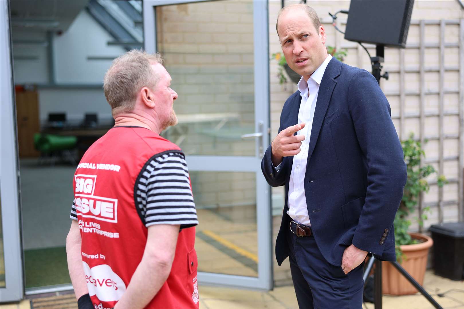 The Prince of Wales meets a member during a visit to the Mosaic Clubhouse in Lambeth (Chris Jackson/PA)