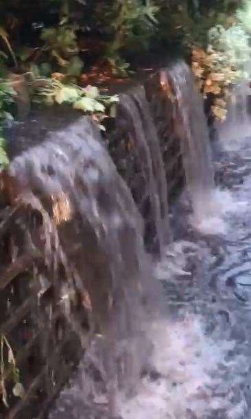 Water pouring into the home of Tamsin and Mark Tolladay in Aylesford