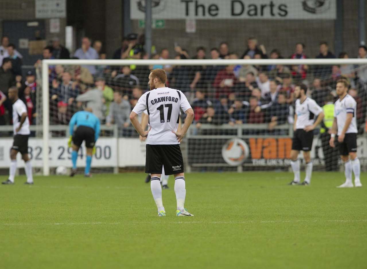 Dartford's players are crestfallen as the Aldershot fans celebrate Josh Scott's goal Picture: Andy Payton