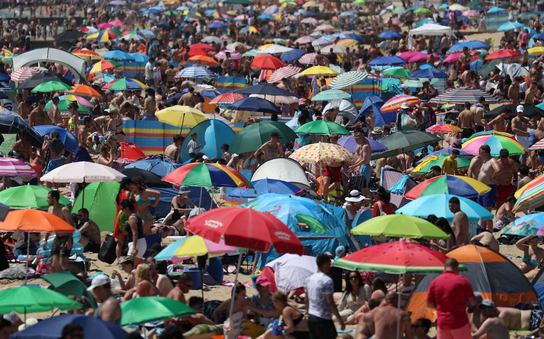 Crowds on the beach in Bournemouth on Thursday (Andrew Matthews/PA)