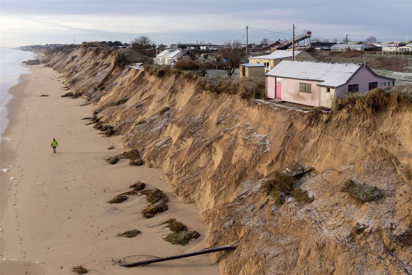 Houses close to the cliff edge at Hemsby (Joe Giddens/PA)