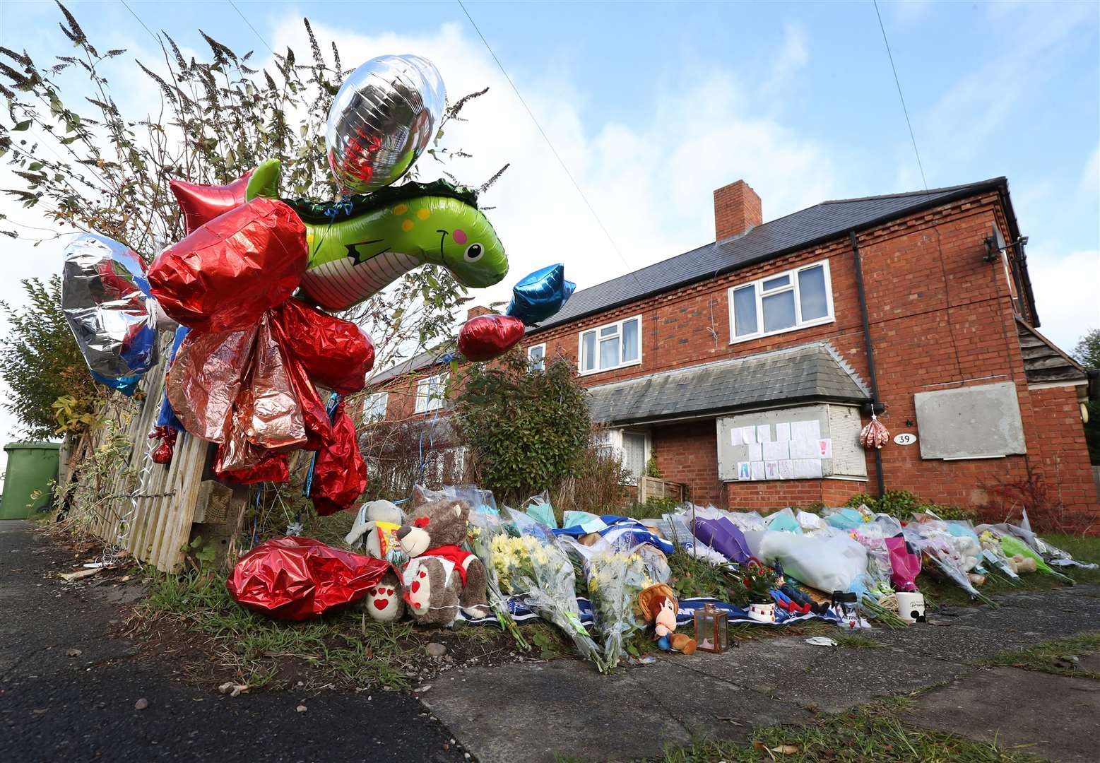 Tributes left outside Arthur’s home in 2021 (Bradley Collyer/PA)