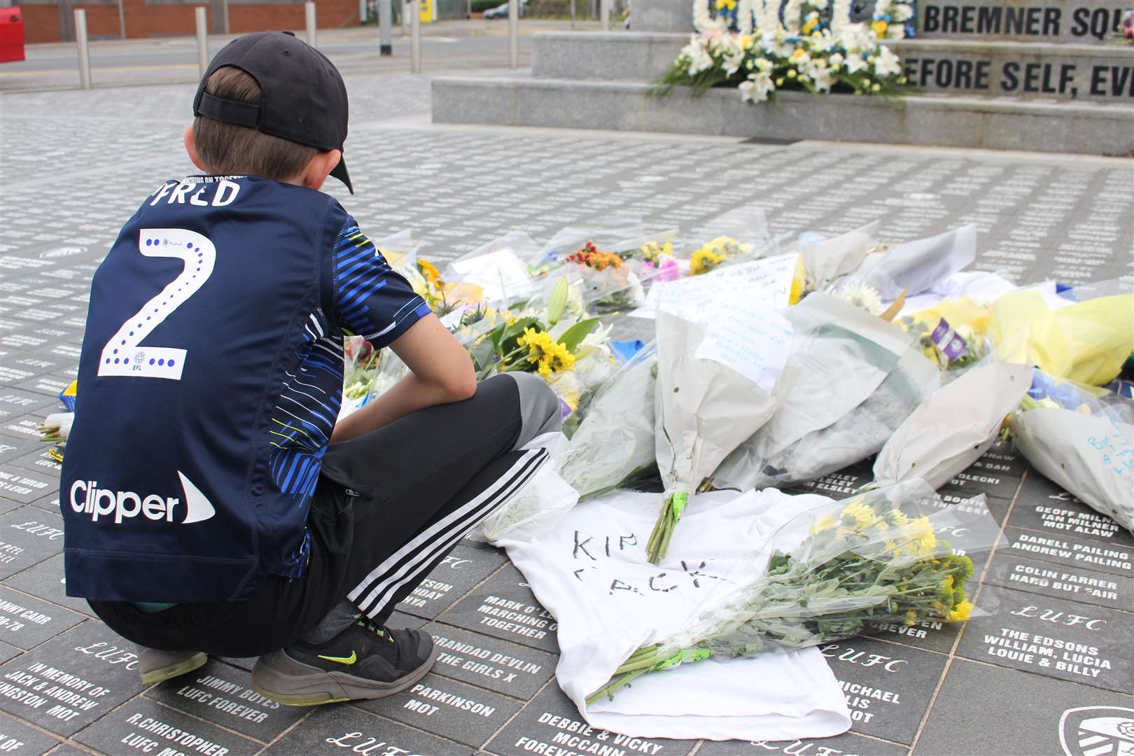 Fred, 10, looks at tributes left for World Cup hero Jack Charlton (Amy Murphy/PA)