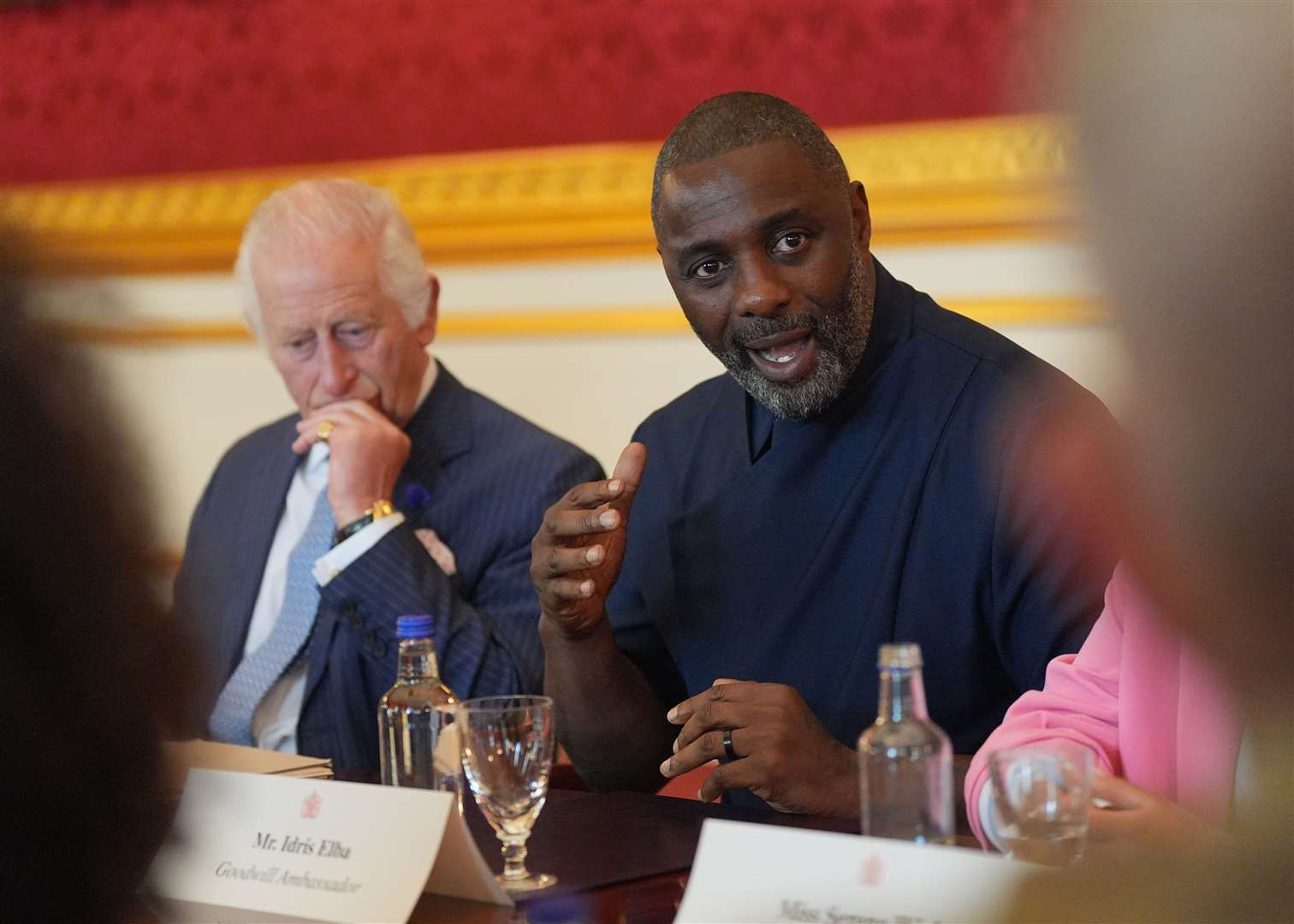 The King and Idris Elba attending an event for The King’s Trust to discuss youth opportunity (Yui Mok/PA)