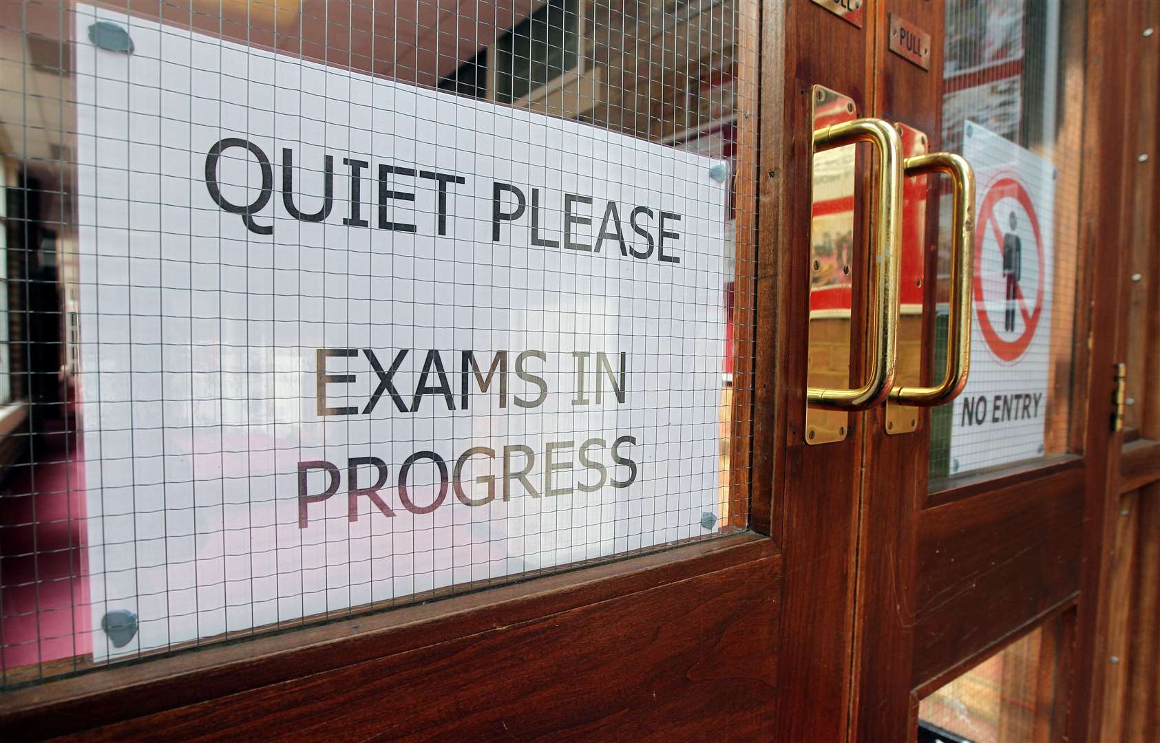 The rolling out of on-screen exams will not happen overnight, according to AQA (David Davies/PA)