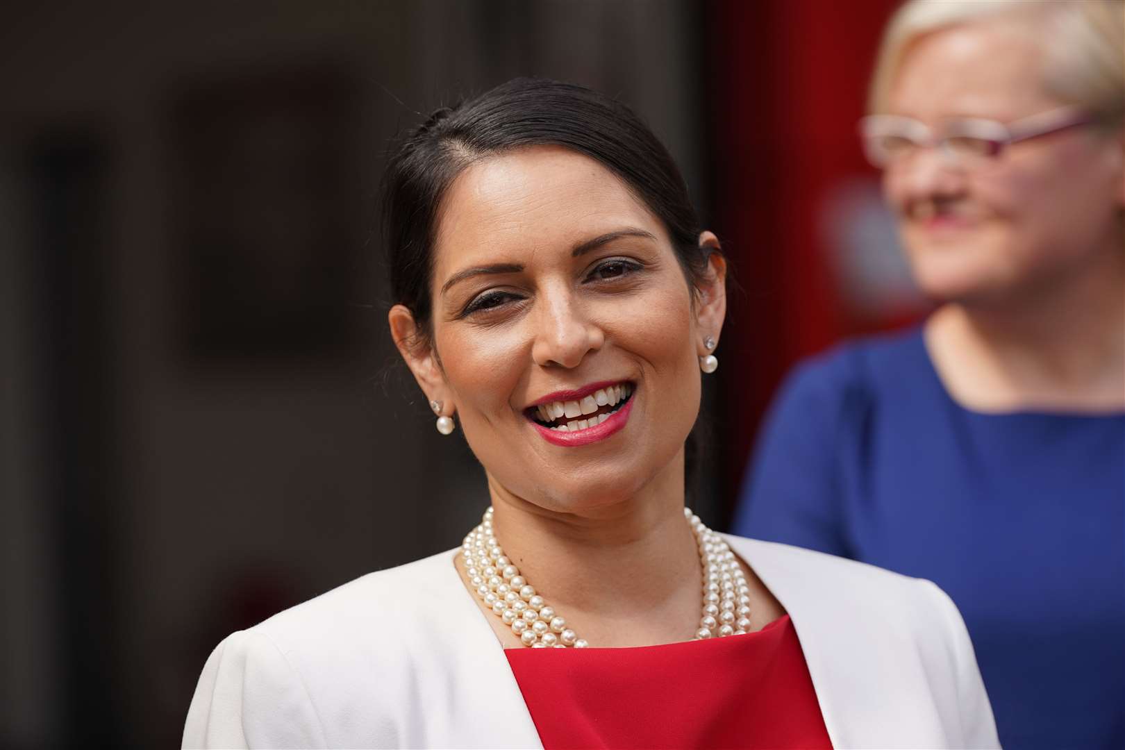 Home Secretary Priti Patel said she was “pushing ahead” with plans to send migrants to Rwanda (Yui Mok/PA)