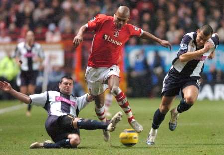 Marcus Bent can't find a way through a resolute West Brom defence. Picture: MATTHEW WALKER