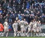 ADDICKS CRASH: Dion Dublin (third from right) celebrates ending Charlton's FA Cup dream. Picture: MATT WALKER