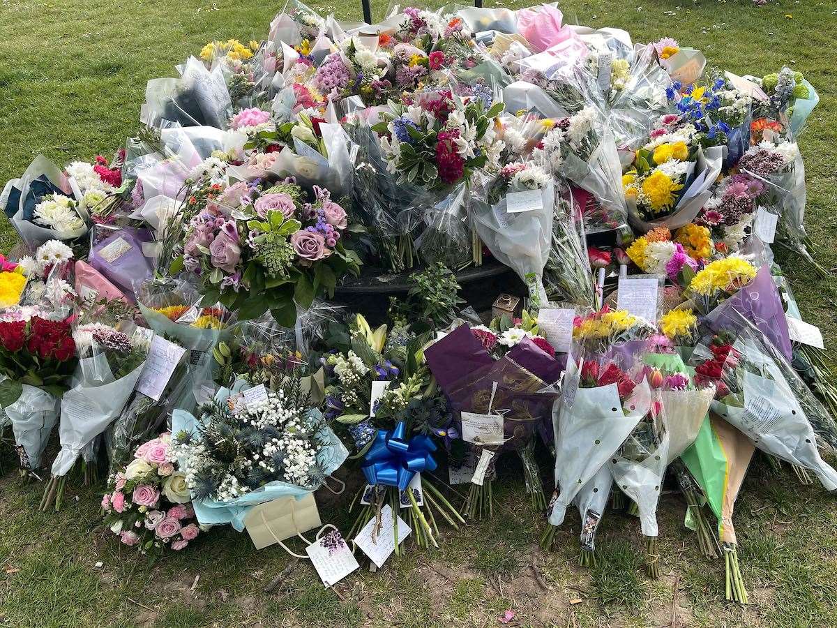 Floral tributes have been laid