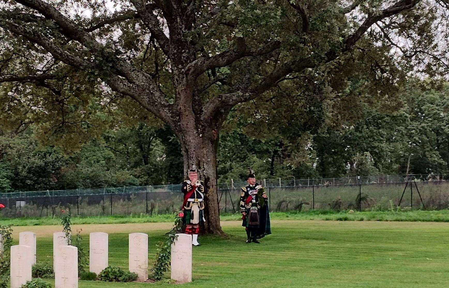 A bugler and piper were present at the rededication service (Crown Copyright/PA)