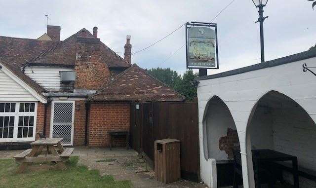 Not viewed easily from the front of the building, the pub sign can be seen much more clearly from the garden. Can you also spot the raven?