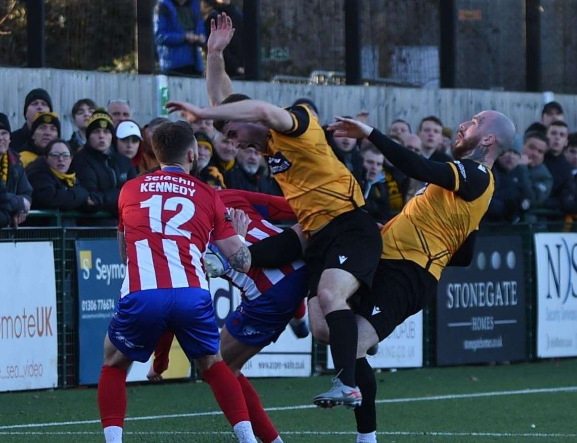 George Fowler and Joe Ellul attack a cross. Picture: Steve Terrell